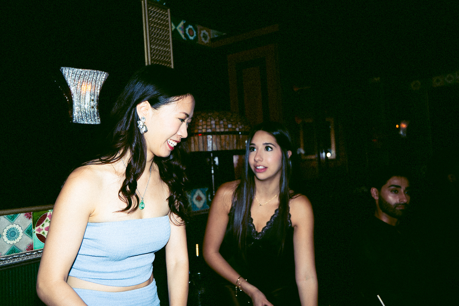 Two well-dressed women chatting